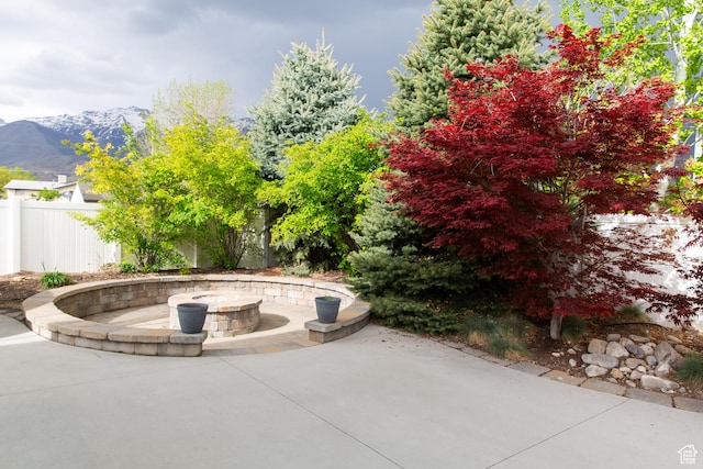 211 S 860 E, Orem, UT 84097 - view of patio / terrace featuring an outdoor fire pit and a mountain view