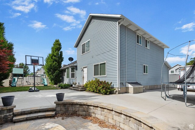 211 S 860 E, Orem, UT 84097 - view of side of property featuring a playground and a patio area