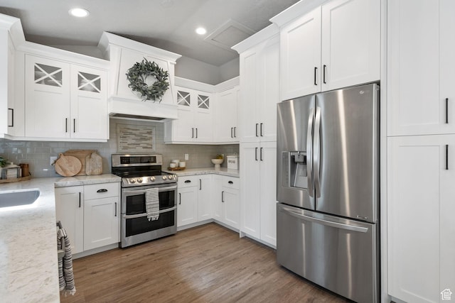 211 S 860 E, Orem, UT 84097 - kitchen featuring appliances with stainless steel finishes, white cabinets, tasteful backsplash, glass insert cabinets, and recessed lighting