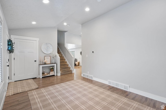 211 S 860 E, Orem, UT 84097 - foyer entrance featuring stairway, recessed lighting, wood finished floors, and vaulted ceiling
