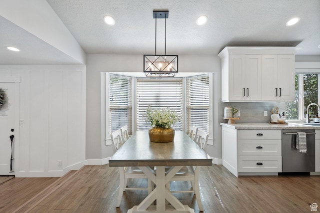 211 S 860 E, Orem, UT 84097 - dining space featuring light wood-style floors, recessed lighting, and a textured ceiling
