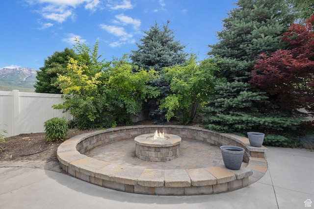 211 S 860 E, Orem, UT 84097 - view of patio featuring an outdoor fire pit and a mountain view