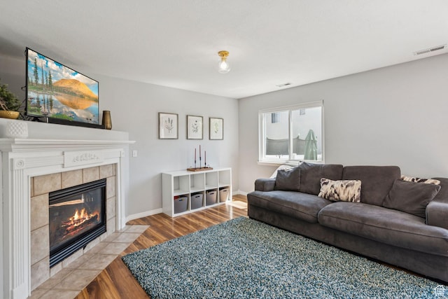 4052 W Newland Loop, Lehi, UT 84043 - living room with wood finished floors and a tiled fireplace