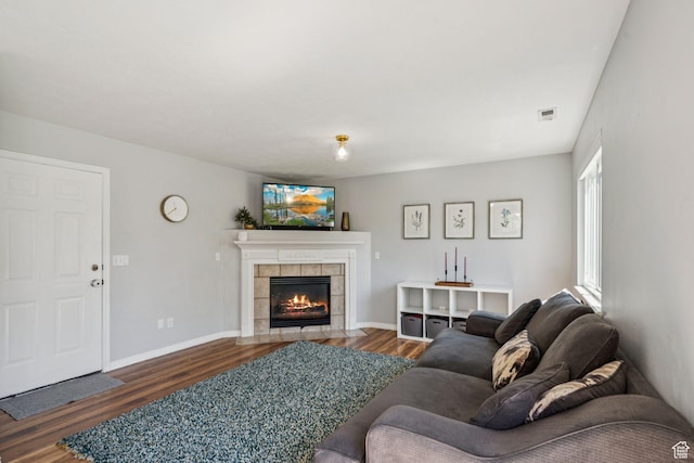 4052 W Newland Loop, Lehi, UT 84043 - living area featuring dark wood-style flooring and a fireplace