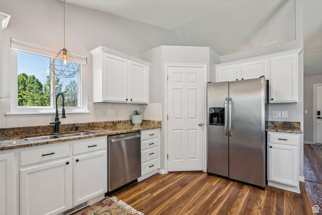 4052 W Newland Loop, Lehi, UT 84043 - kitchen with appliances with stainless steel finishes, dark wood-style flooring, white cabinets, and dark stone countertops