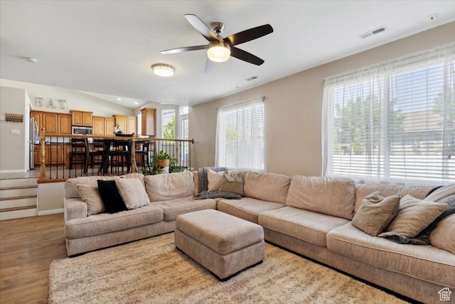 4124 S 3475 W, West Haven, UT 84401 - living area with a ceiling fan, wood finished floors, and lofted ceiling