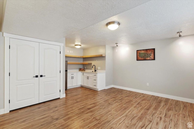 4124 S 3475 W, West Haven, UT 84401 - basement featuring light wood finished floors and a textured ceiling