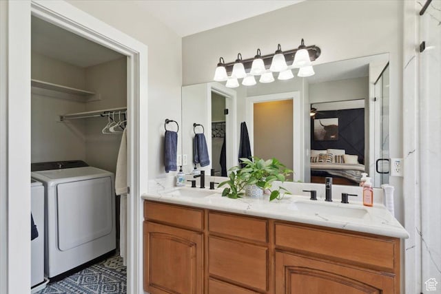 4124 S 3475 W, West Haven, UT 84401 - ensuite bathroom featuring washing machine and clothes dryer and double vanity