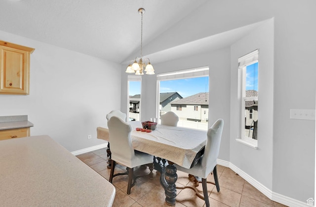 4317 S 3350 W, West Haven, UT 84401 - dining space featuring a chandelier, light tile patterned floors, and vaulted ceiling