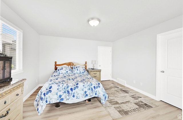 4317 S 3350 W, West Haven, UT 84401 - bedroom featuring light wood finished floors and multiple windows