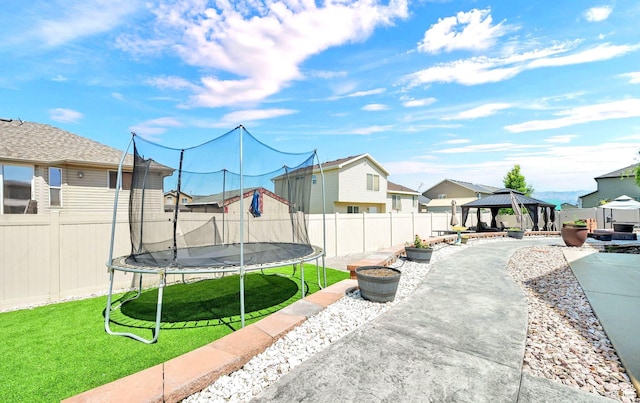 4317 S 3350 W, West Haven, UT 84401 - view of home's community featuring a trampoline, a gazebo, a patio area, a residential view, and a fenced backyard