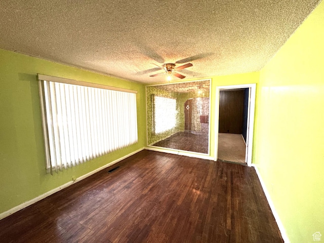 240 E 300 S, Kamas, UT 84036 - unfurnished room with wood finished floors, a ceiling fan, and a textured ceiling