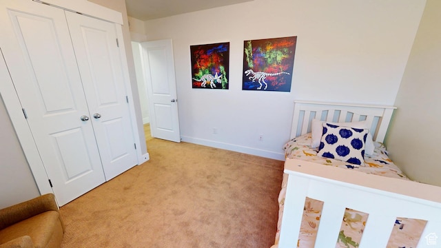 10612 S Lake Ave, South Jordan, UT 84009 - bedroom featuring light colored carpet and a closet