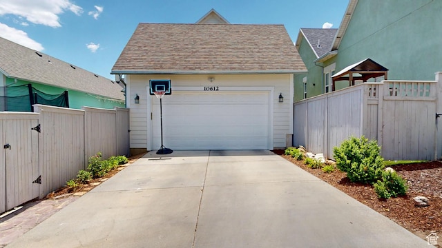 10612 S Lake Ave, South Jordan, UT 84009 - garage with concrete driveway