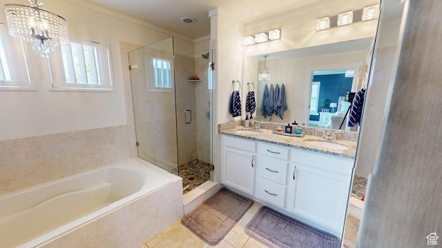 10612 S Lake Ave, South Jordan, UT 84009 - ensuite bathroom featuring a garden tub, a shower stall, double vanity, healthy amount of natural light, and ornamental molding