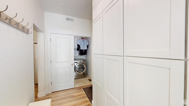 10612 S Lake Ave, South Jordan, UT 84009 - washroom with washer / dryer and light wood-type flooring