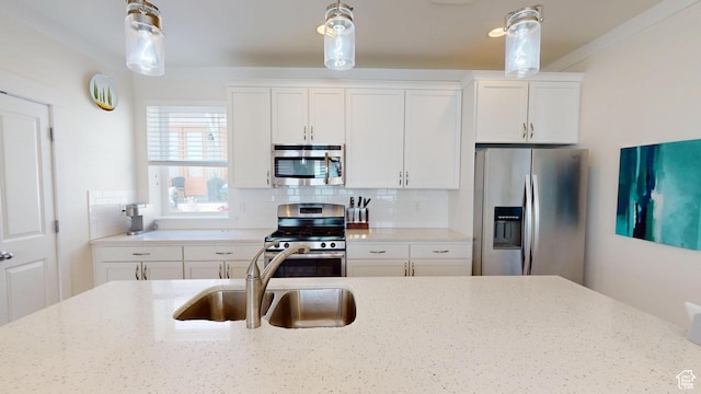 10612 S Lake Ave, South Jordan, UT 84009 - kitchen featuring appliances with stainless steel finishes, pendant lighting, and decorative backsplash