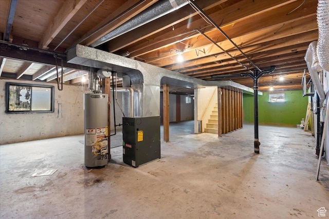 3705 W 3800 S, West Valley City, UT 84120 - basement with gas water heater, stairs, and heating unit