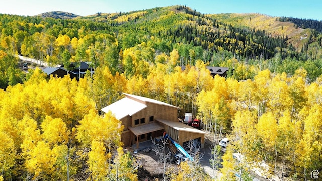 11234 E Columbine Ln, Heber City, UT 84032 - view from above of property with a heavily wooded area and a mountainous background