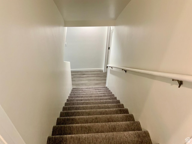 2953 W Ezra Dr, Cedar City, UT 84720 - stairs featuring wood finished floors and baseboards