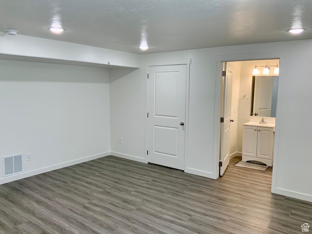 2953 W Ezra Dr, Cedar City, UT 84720 - finished basement featuring wood finished floors and baseboards