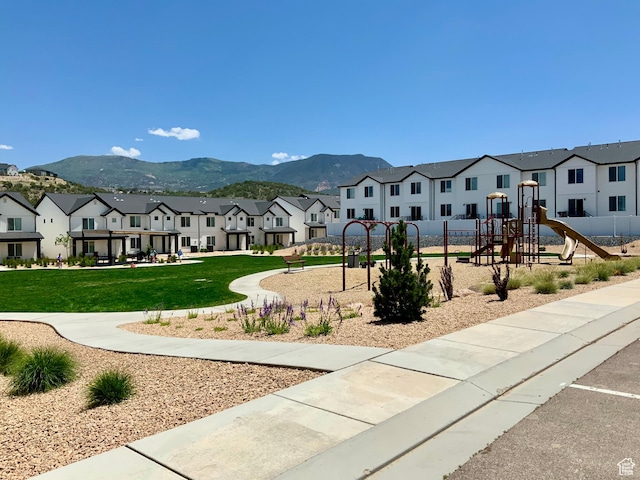2953 W Ezra Dr, Cedar City, UT 84720 - surrounding community featuring a residential view, a yard, and a mountain view