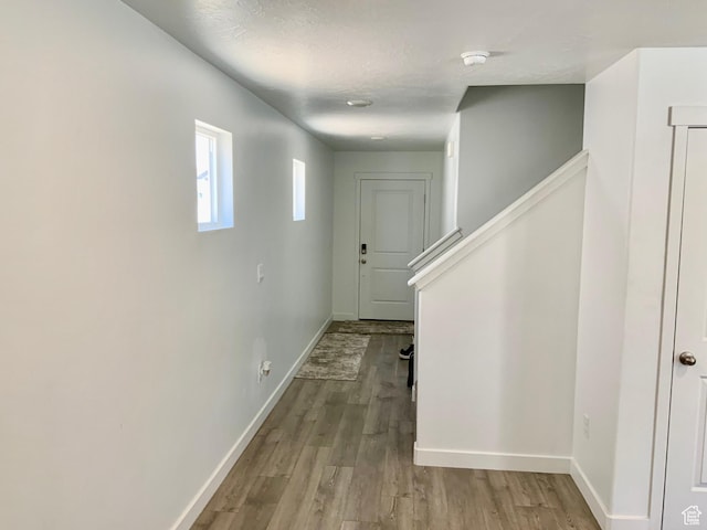 2953 W Ezra Dr, Cedar City, UT 84720 - hall with wood finished floors and baseboards
