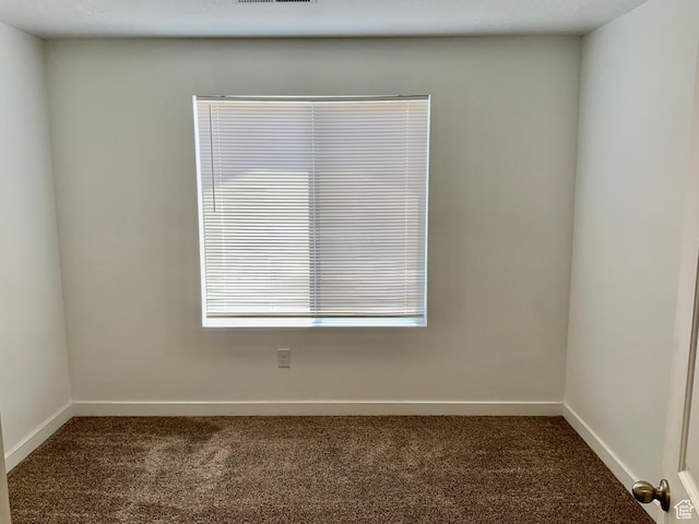 2953 W Ezra Dr, Cedar City, UT 84720 - carpeted empty room featuring baseboards