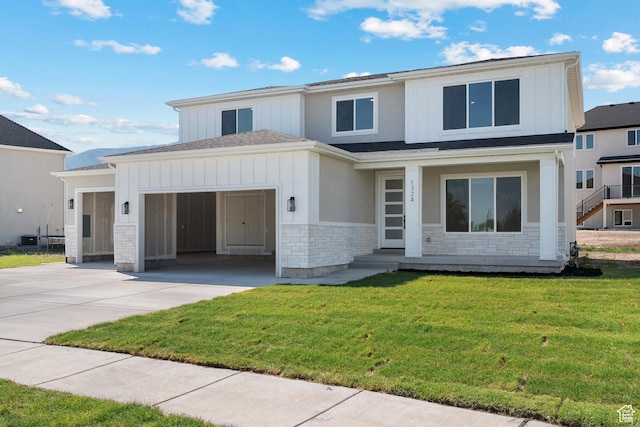 1324 E 320 S, Payson, UT 84651 - view of front of house featuring driveway, board and batten siding, stone siding, and an attached garage