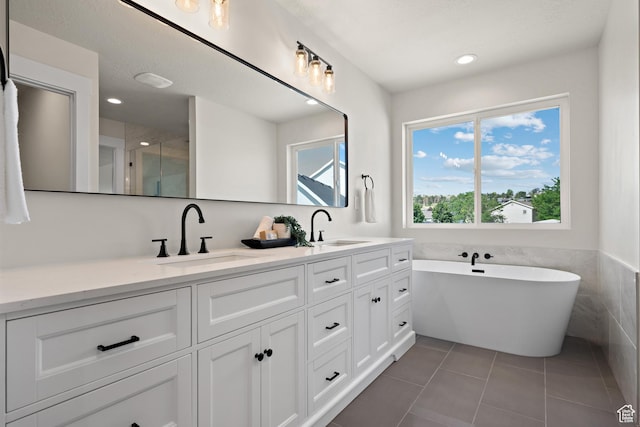 1324 E 320 S, Payson, UT 84651 - bathroom with double vanity, a freestanding bath, tile patterned floors, and recessed lighting