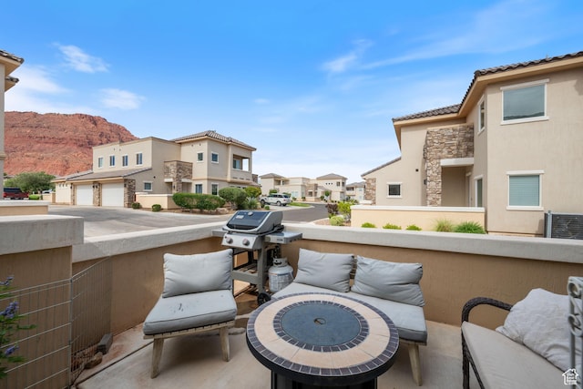 140 W Center St Unit 29, Ivins, UT 84738 - view of patio / terrace with a residential view, area for grilling, and a mountain view
