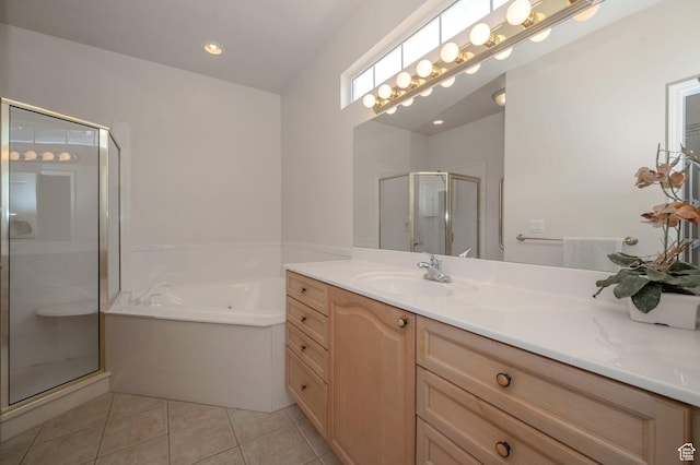 10056 S Remembrance Ln, South Jordan, UT 84095 - full bathroom with a shower stall, double vanity, a bath, and tile patterned flooring