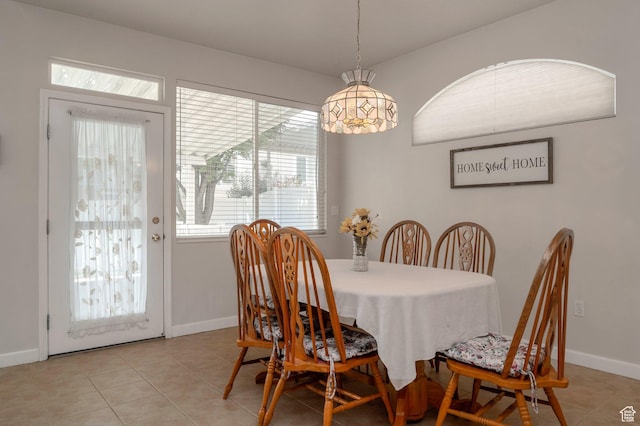 10056 S Remembrance Ln, South Jordan, UT 84095 - dining room featuring baseboards and light tile patterned floors