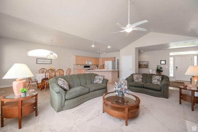 10056 S Remembrance Ln, South Jordan, UT 84095 - living room featuring vaulted ceiling, a ceiling fan, and light colored carpet