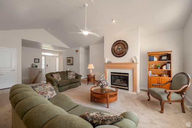 10056 S Remembrance Ln, South Jordan, UT 84095 - living room with vaulted ceiling, a fireplace with flush hearth, light carpet, and ceiling fan