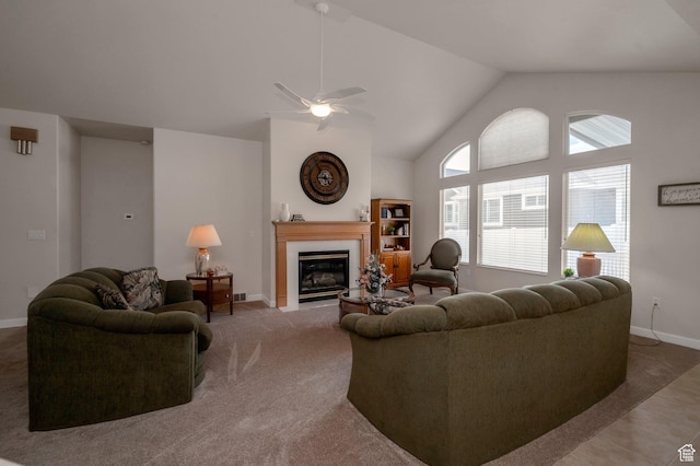 10056 S Remembrance Ln, South Jordan, UT 84095 - carpeted living room featuring a glass covered fireplace, ceiling fan, and high vaulted ceiling