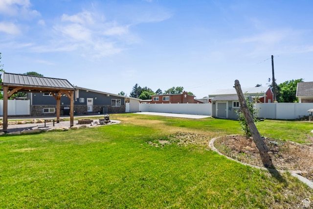 790 E 5300 S, South Ogden, UT 84405 - fenced backyard featuring a fire pit and a storage unit