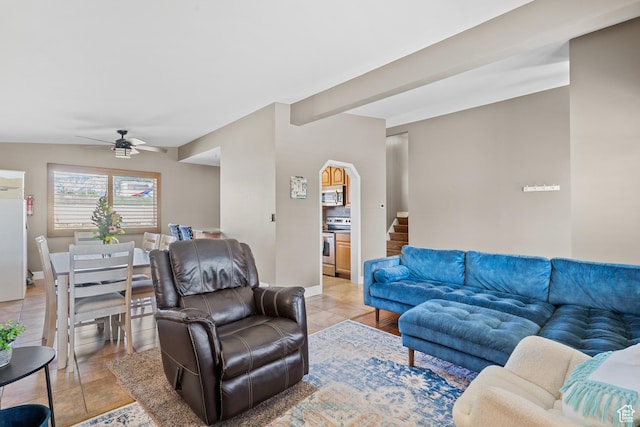 790 E 5300 S, South Ogden, UT 84405 - living room featuring a ceiling fan, light tile patterned flooring, and arched walkways