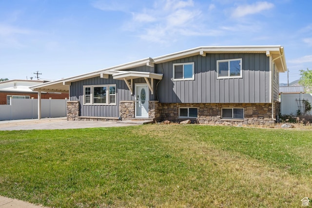 790 E 5300 S, South Ogden, UT 84405 - tri-level home featuring board and batten siding, a patio, and stone siding