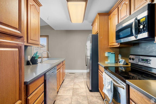 790 E 5300 S, South Ogden, UT 84405 - kitchen with appliances with stainless steel finishes and light tile patterned flooring
