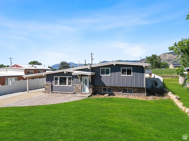 790 E 5300 S, South Ogden, UT 84405 - split level home with board and batten siding, a mountain view, and stone siding