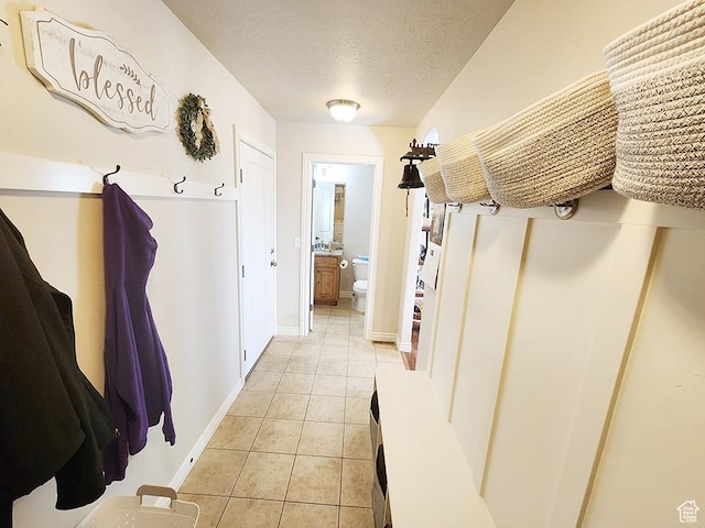 1365 N Highland Blvd, Brigham City, UT 84302 - mudroom with light tile patterned floors and a textured ceiling