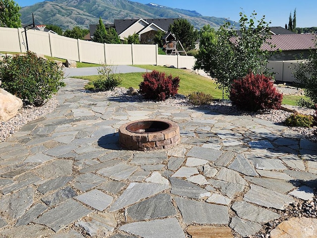 1365 N Highland Blvd, Brigham City, UT 84302 - view of patio with a fire pit and a mountain view