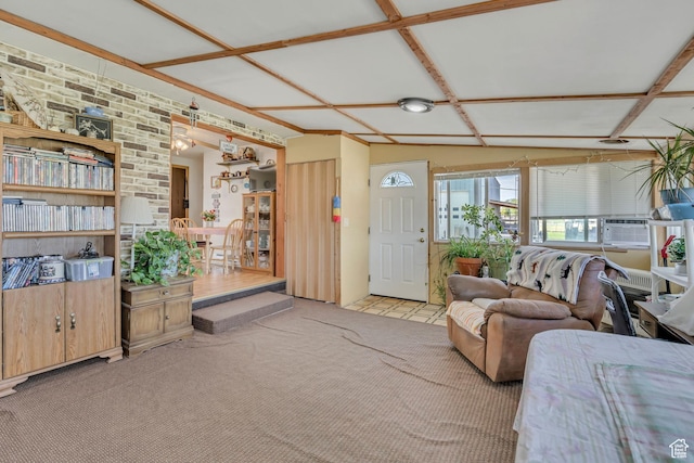 501 N Main St, Vernon, UT 84080 - living room featuring carpet flooring, brick wall, and cooling unit