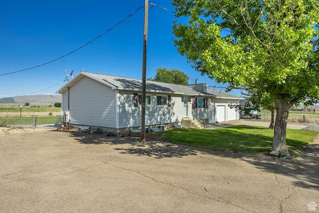 501 N Main St, Vernon, UT 84080 - single story home with an attached garage and driveway