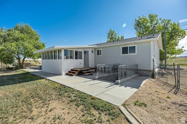 501 N Main St, Vernon, UT 84080 - rear view of property featuring a patio