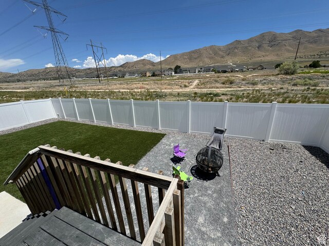 4082 N Poplar Dr, Eagle Mountain, UT 84005 - fenced backyard with a mountain view