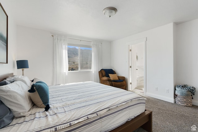 4082 N Poplar Dr, Eagle Mountain, UT 84005 - carpeted bedroom with baseboards and ensuite bathroom