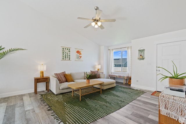 4082 N Poplar Dr, Eagle Mountain, UT 84005 - living area with light wood finished floors, a ceiling fan, vaulted ceiling, and radiator heating unit