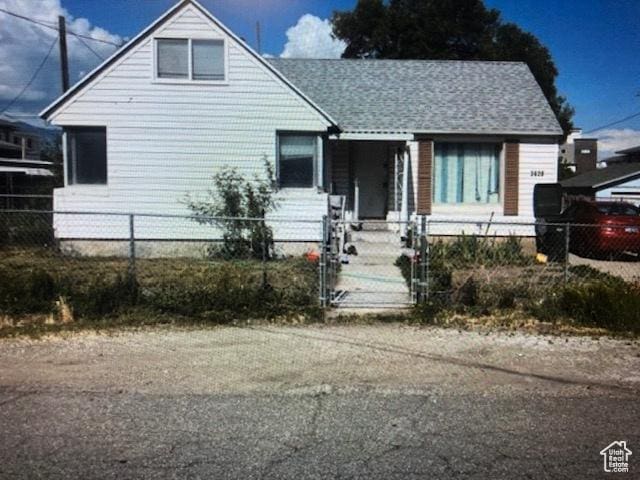 3628 S 5450 W, West Valley City, UT 84120 - bungalow-style home with a fenced front yard